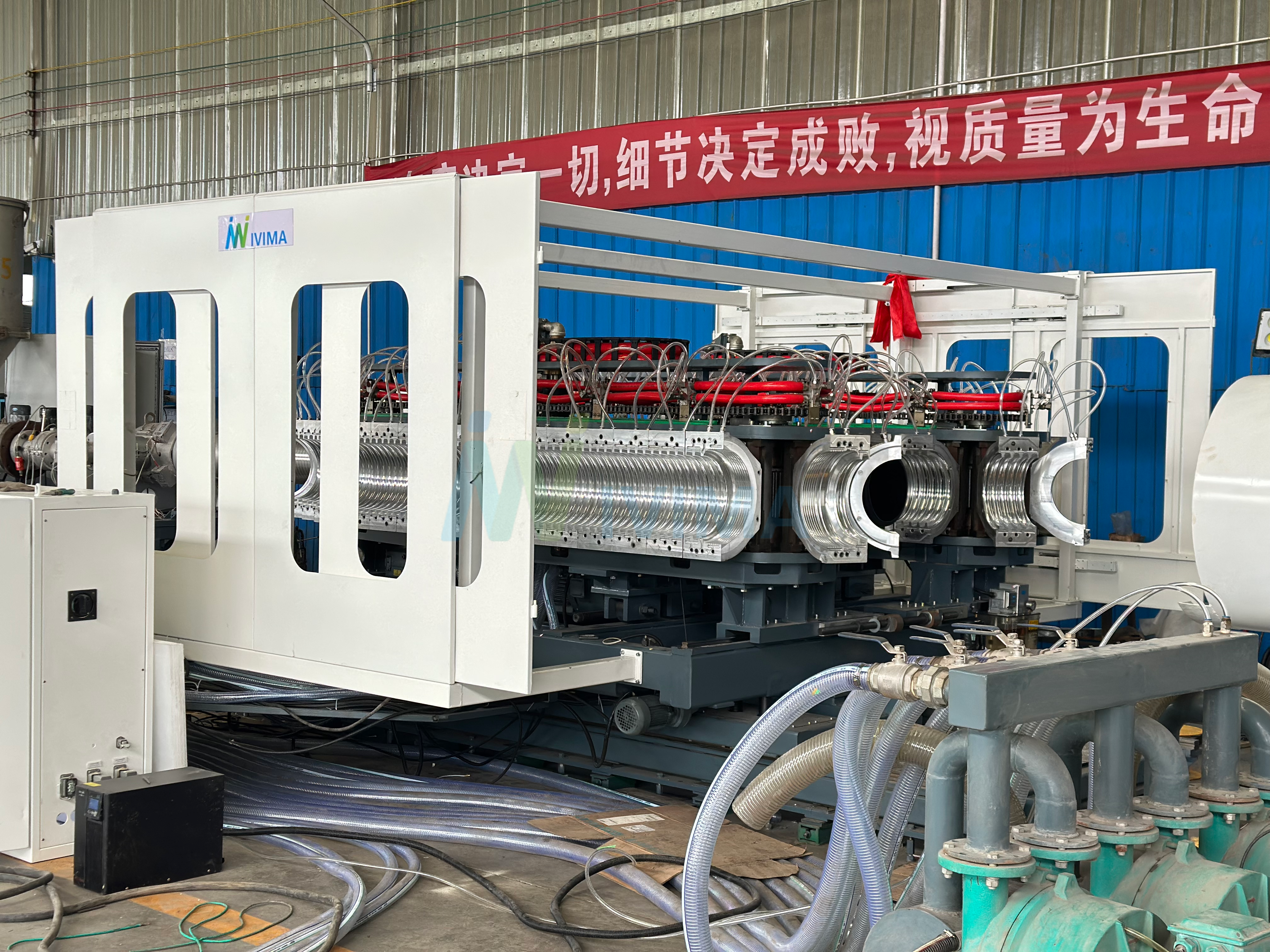 Double-Wall Corrugated Pipe Forming Machine with Vacuum Synchronization High-speed double wall corrugated pipe forming machine system with synchronized vacuum distribution for geometric stability control